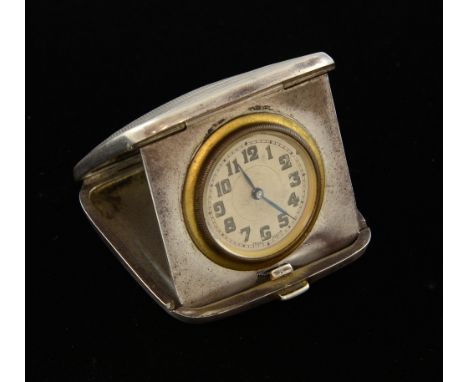 George V travelling clock in engine turned silver case, Birmingham 1930, 4.5 cms.     