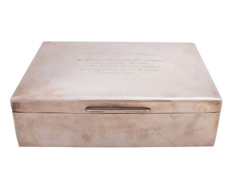 A silver presentation cigarette casket to Mr C. W.  Wilson from Aberdeen Shipbuilders Association, maker William Coymns & Son