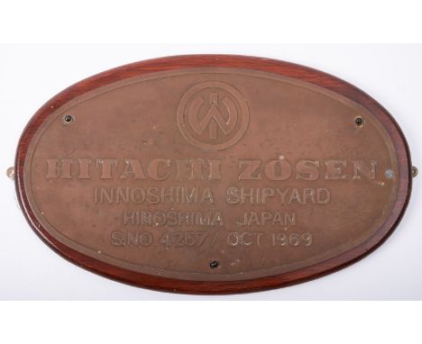 A brass maker's plate for the Japanese built  Deutche Africa Line cargo vessel 'Woermann Ubangi' by the  'Hitachi Zosen', num