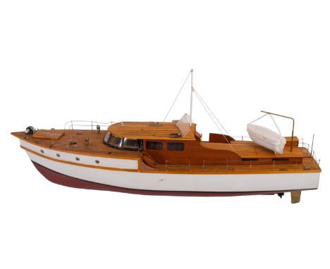 A scratch built model 'Genevieve J' pleasure boat. Having a removable deck house on a teak deck over plank and pin hull, fini