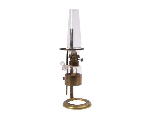 A late 19th century lacquered brass microscope lantern, maker Swift & Son, London , with glass reservoir and shade on an adju