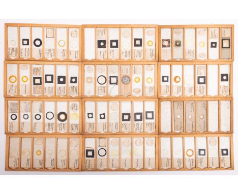Ten cases of 20th Century mainly botanical microscope slides. The specimens comprise a range of flora including tree and plan