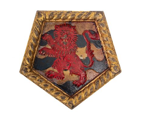 A 20th Century cast iron brass ship's badge for HMS 'Kenya'. Of pentagon form with armorial to the centre, paper label to rev