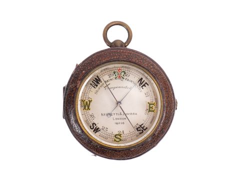 A circular brass Compensated pocket barometer, maker Negretti & Zambra, London, serial number '18238', the silvered calibrate