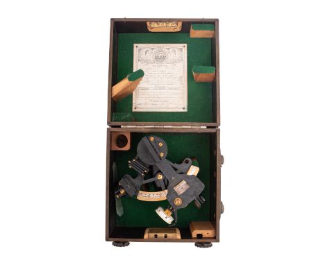 An early 20th Century 3.5' sextant, maker Henry Hughes & Son, set within a fitted case with paper label to the inside lid, si