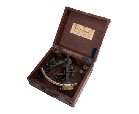 An early 20th century 8 inch vernier brass sextant unsigned the brass arc inset silvered arch calibrated to 170°, fitted sigh