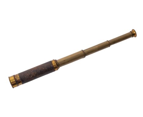 A 19th Century leather bound brass three drawer telescope. Unsigned with lens shades, 18cm long (closed)