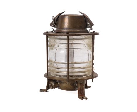 A Dutch brass end of pier lamp. Having a domed top over circular body with maker's plate type number 1464V, with clear glass 