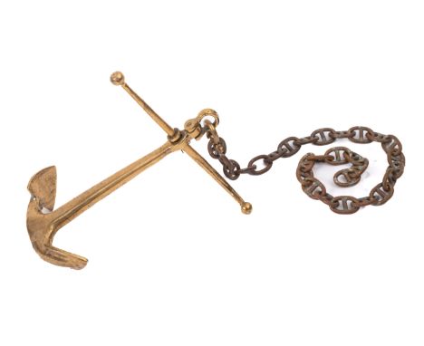 A 20th Century Brass Admiralty pattern anchor. With pull through rod and on a brass chain, 22cm high. 