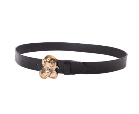 A brass Siebe style diver's helmet waist belt clasp on black leather belt.