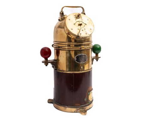 An early 20th Century 'Faithful Freddie' gimbal compass, maker Kelvin, Bottomley & Baird Ltd, Glasgow. Set in a brass and mah