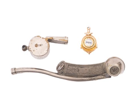 A 9ct gold fob compass in the form of a foul anchor, 2.4g, together with  an early 20th century Bosun's whistle with engraved