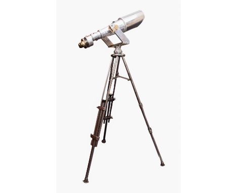 A Nikon 20x120 binocular telescope. Serial number; 4130487, the plated body with brass eye pieces, on a fork mount and maker'