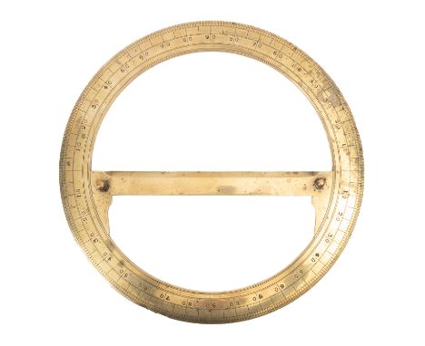 An early 19th century brass protractor, unsigned with central rule and calibrated ring, diameter 29.1 cm