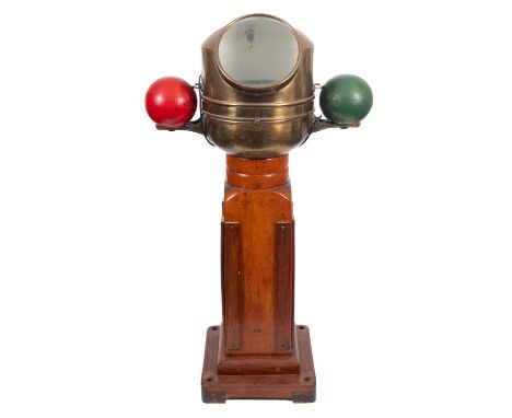 A 20th Century ship's binnacle, maker Lilley & Reynolds Ltd of London. Having an 8' diameter compass, under a domed cover on 