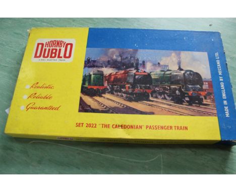 A boxed Hornby Dublo set 2022 'The Caledonian' passenger trail (two rail), appears complete (light playworn condition box has