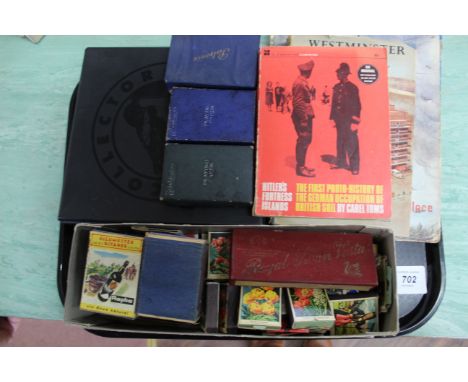 A mixed lot to include a coin album with UK, USA and world coins, Matchbox Collection, three sets of playing cards plus a sel