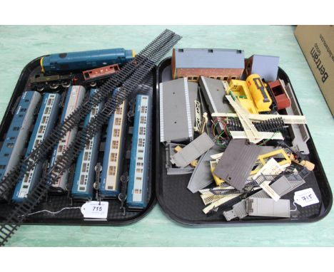 An Airfix 1466 loco together with a Hornby engine and six carriages plus a tray of trackside accessories