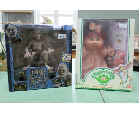 A 'Toy Biz' Lord of the Rings electronic talking Gollum together with a 'Play Along' Cabbage Patch Kids adoptable Liana doll