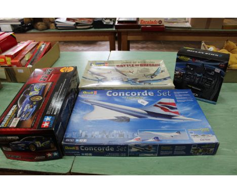 A boxed 'Tamiya' TT-02 radio controlled car, Carson Reflex Stick 2 6 channel controlled, Revell Battle of Britain four model 