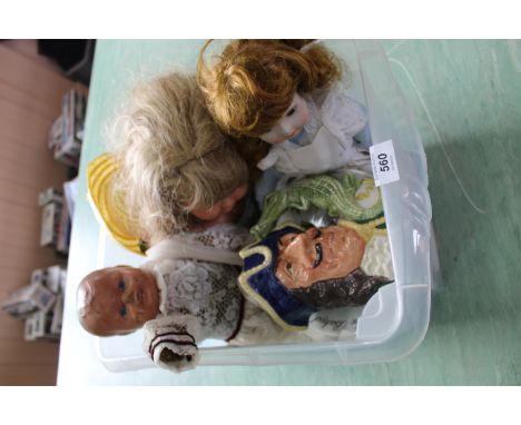 Three collectors dolls, two with plastic heads, one with ceramic together with a Royal Doulton Captain Hook character jug D66