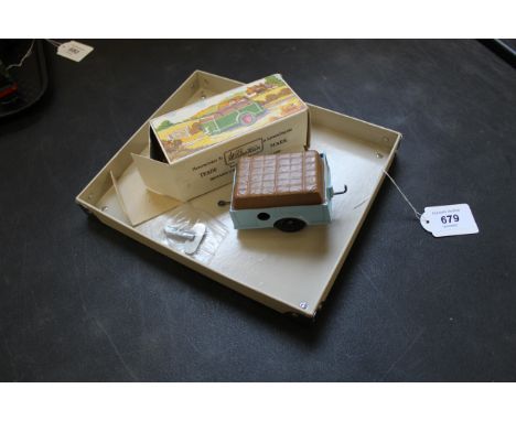 A vintage boxed W. Britain clockwork trailer model No.Z041 (light playworn condition) with key and instructions (box with age