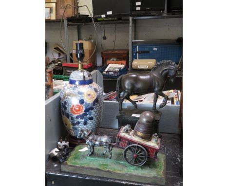 BRONZED HORSE ON BASE, A FLORAL DECORATED CERAMIC LAMP &amp; A HORSE AND CART MODEL&nbsp;## pat tested ##