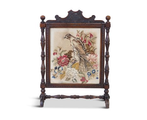 A LARGE 19TH CENTURY ARTS &amp; CRAFTS MAHOGANY FRAMED FIRE SCREEN, the cornice decorated with trailing floral motifs and fru