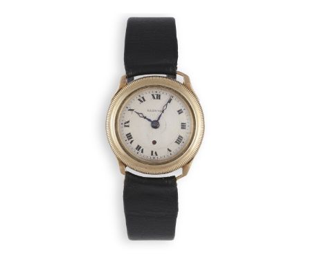 A LADY'S MANUAL WIND WATCH, BY HARWOOD, the champagne dial with applied gilt baton and roman numerals, on black leather strap