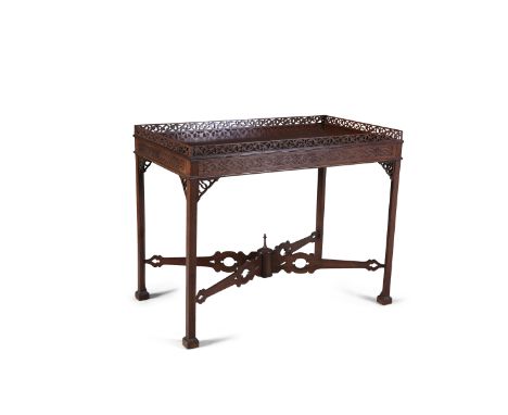 A GEORGE III MAHOGANY RECTANGULAR SIDE TABLE, in the Chinese Chippendale manner, with a raised pierced gallery and blind fret