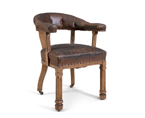 A PAIR OF PUGIN STYLE OAK FRAME TUB BACK CHAIRS, with brown leather button-back and square fluted gallery back, above close n