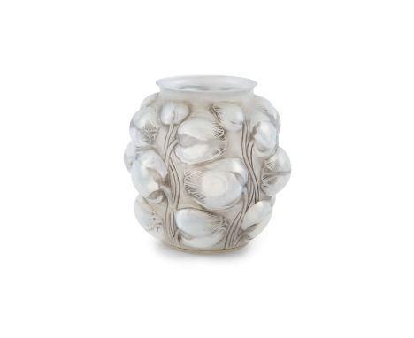 A LALIQUE GLASS TULIP VASE, c.1927, of circular form, with blue tone body moulded to the exterior with flower head and curlin