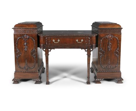 AN EDWARDIAN MAHOGANY TWIN PEDESTAL SIDEBOARD, in 'Chinese Chippendale' taste, the breakfront top with gadrooned edge with ra