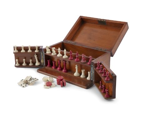 A MAHOGANY GAMES BOX INCLUDING IVORY CHESS SET ETC. 