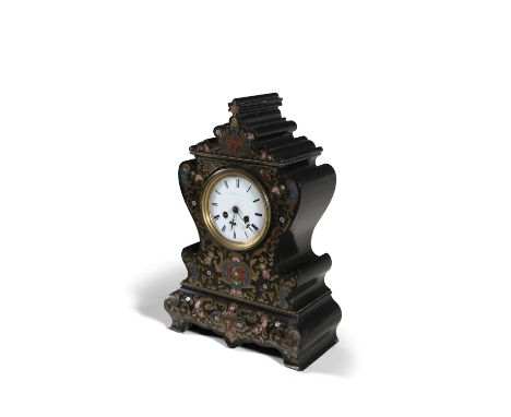 A FRENCH EBONISED AND CUT BRASS MANTLE CLOCK, 19th century, by Valery, Paris, having cartouche shaped body and white enamel d