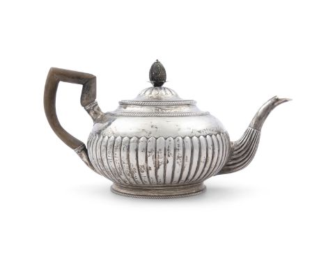 A GEORGE III IRISH SILVER TEAPOT, Dublin 1805, mark of Richard Sawyer, of circular form, the demi-fluted body applied with hi