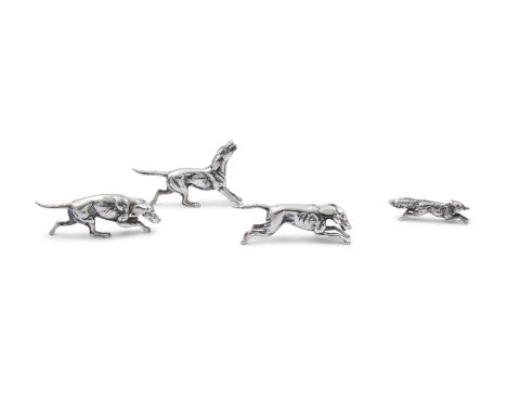 AN IRISH FOUR PIECE SILVER FOX-HUNTING GROUP, Dublin 1983, comprising of fox and three hounds each solid cast and modelled in