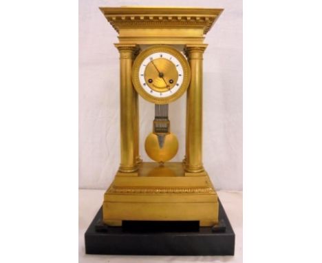 Fine Mid C19th French Gilt Pillar Clock with 8 day 2-train movement striking on half hour, engine turned dial signed JM Binge