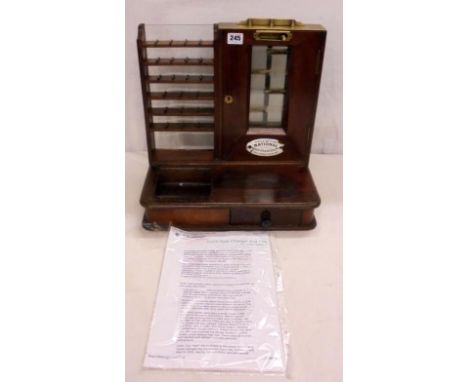 C19th National Cash Register Co. Gold Changer designed by John Cox, 6 shelves with 4 dividers to each, 2 sided glass door to 