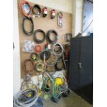 Large Assortment of Hosing & Belts (Some New) On Wall