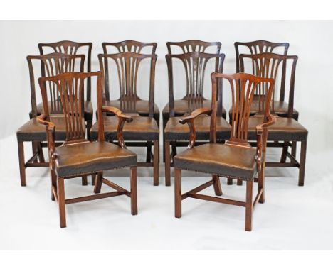 A British Chippendale style set of 10 carved beech Dining chairs upholstered in brown leather, two of which with arms, mid 20