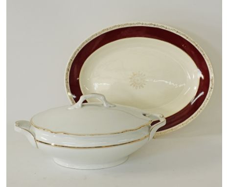 An English ceramic oval meat platter with gilding and red band to the rim 41X32cm, together with an oval white porcelain soup
