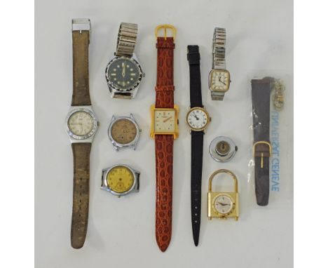 A Universal Geneve 18K gold ladies wrist watch, the face 30X35mm with a leather strap, together with a collection of various 