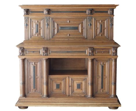A Dutch / Flemish Renaissance style oak and ebony dresser on bun feet, in two parts, the upper loose case with geometrical bo