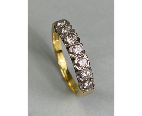 18ct yellow gold Diamond ring set with seven diamonds size 'R' and total weight approx 6.1g