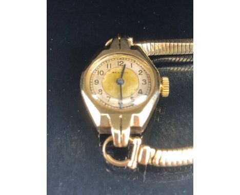 9ct Gold watch, movement by BENSON with a 9ct Gold strap, Gold case in an Art Deco style total weight approx 16g