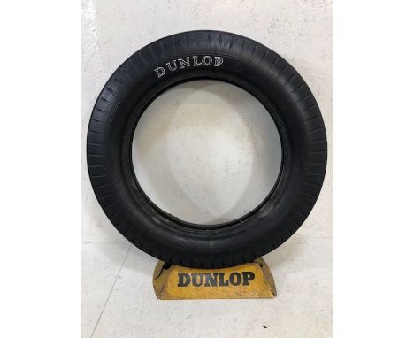 Motoring interest: Dunlop promotional/advertising tyre on original Dunlop tinplate stand