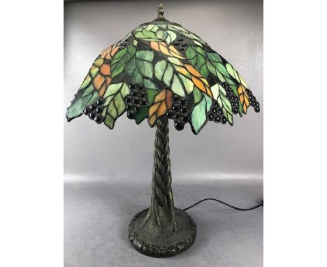 Tiffany style decorative table lamp, shade decorated with vines and grapes, approx 66cm in height