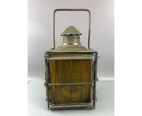 Brass ships lamp, with amber glass, approx 22cm x 16cm x 41cm tall (to top of handle), converted for electricity