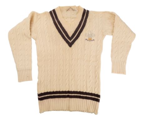 Percy G.H. Fender cricket archive: 1920's: A Surrey cricket sweater/ jumper, brown coloured bands, embroidered Prince of Wale